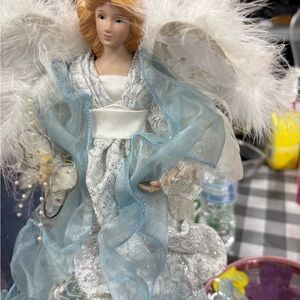 Elegant Angel Figurine Tree Topper with Blue and White Accents